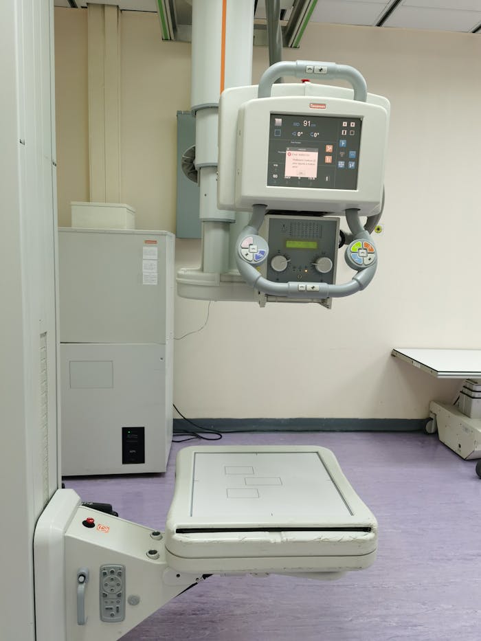 A detailed view of a hospital's modern X-ray equipment in a clinical setting.